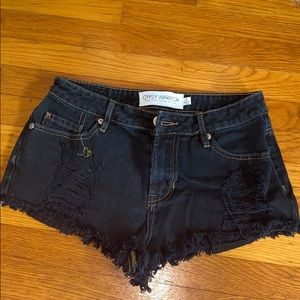 Ripped dark blue jean shorts